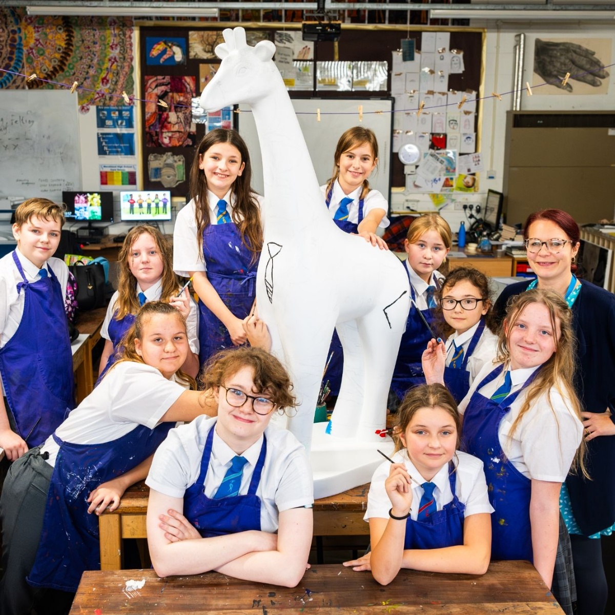 Marshland High School Our artists paint the town tall